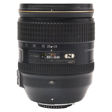 Nikon AF-S 24-120mm f4G ED VR zoom lens standing upright showing zoom ring markings and front cap