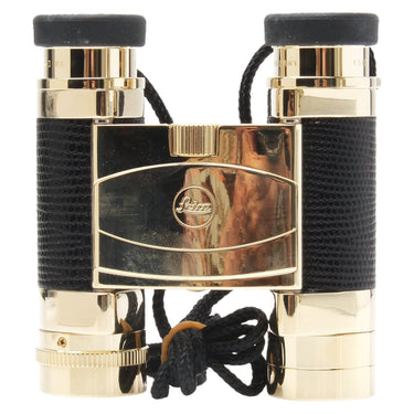 Leica Trinovid 8x20 Edition binoculars front view with gold Leica logo plate and lanyard