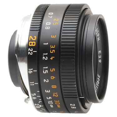 Leica 28mm f2.8 Elmarit-M Asph angled view showing distance scale and focus tab