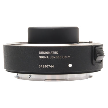 Sigma TC-1411 teleconverter side view showing serial number and mounted cap