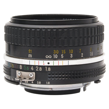 Nikon 50mm f1.8 AI Nikkor lens side view showing focus and aperture rings