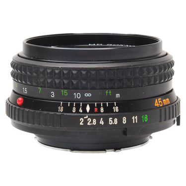 Minolta 45mm f2 MD Rokkor-X front three-quarter view showing focus and aperture scales