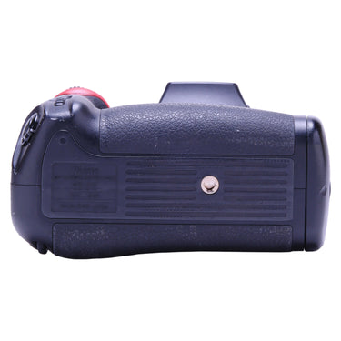 Nikon MB-D10 battery grip base plate showing model label and tripod socket