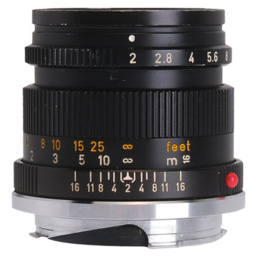 Leica 50mm f2 Summicron side view showing aperture scale, focus ring, and red mount index