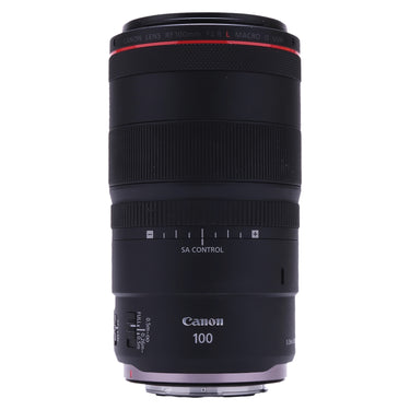 Canon RF 100mm f2.8 L Macro IS USM lens front standing upright showing engraving
