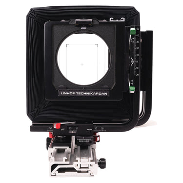 Linhof Technikardan 4x5 front view showing lens standard frame, movement scales, and green control levers
