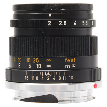 Leica Summicron 50mm f2 v3 front three-quarter view showing aperture and depth of field scales with bare M mount