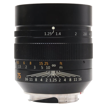 7Artisans 75mm f1.25 II front view showing aperture and depth-of-field scales with built-in hood