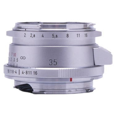 Voigtlander Ultron 35mm f2 II silver lens side view showing aperture and focus scales