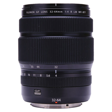Fujifilm GF 32-64mm f4 R LM WR lens front three-quarter view showing barrel markings and zoom scale