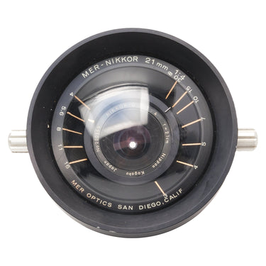Nikon MER-Nikkor 21mm f4 front view showing engraved aperture and distance scale