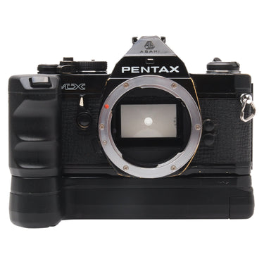 Pentax MX black 35mm SLR front view with bare lens mount and attached winder