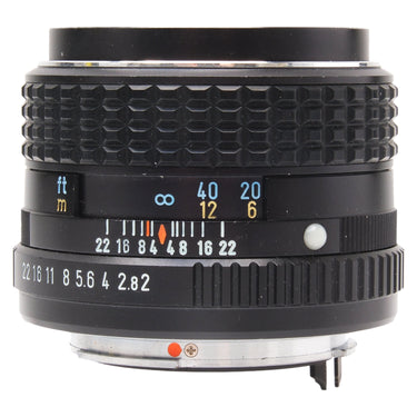 Pentax SMC-M 85mm f2 lens side view showing aperture ring and focus scale