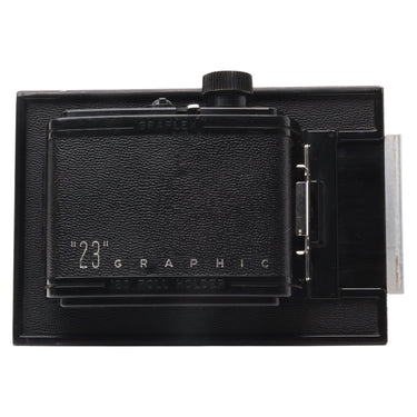 Graflex 23 Graphic 120 roll film holder front leatherette panel with darkslide tab at right