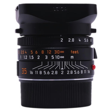 Leica Summicron-M 35mm f2 ASPH lens side view with mounted hood, aperture and focus scales
