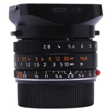 Leica 28mm f2.8 Elmarit-M ASPH with 12520 clip-on hood mounted, front angle showing aperture and distance scales