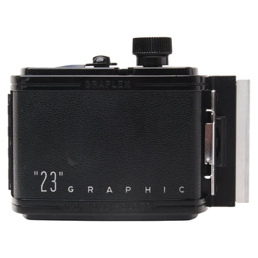 Graflex 23 Graphic 120 roll film holder leatherette side with model markings and darkslide inserted