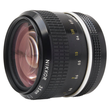 Nikon Nikkor 35mm f2 lens angled front view showing front element and distance scale
