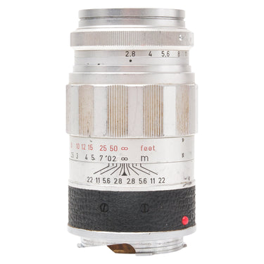 Leica 90mm f2.8 Elmarit-M silver lens side view showing aperture and distance scales