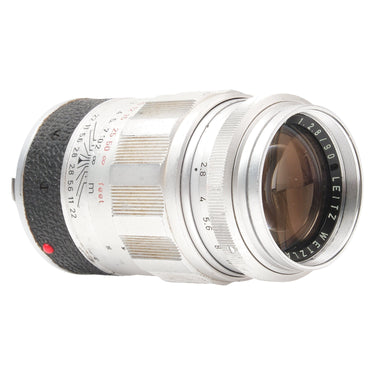 Leica 90mm Elmarit-M angled front view showing front glass and aperture ring