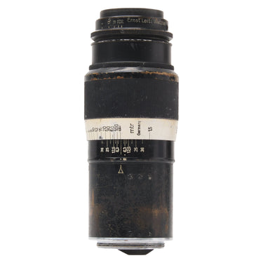 Leica 13.5cm f4.5 Hektor lens standing upright, Ernst Leitz Wetzlar engraving and distance scale with heavy brassing