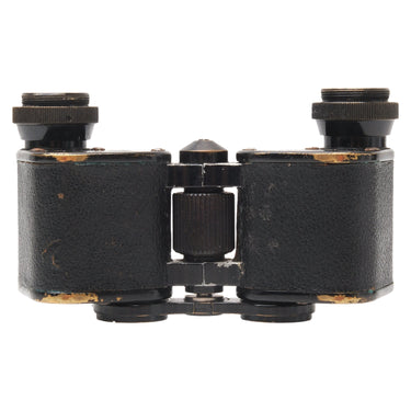 Leica 3x20 opera glasses top view showing eyepieces, focus wheel, and edge brassing