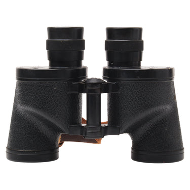 Nikon 6x30 Nippon Kogaku binoculars front view with eyepieces and strap tucked