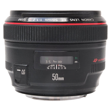 Canon EF 50mm f1.2 L USM front barrel showing distance scale window and AF MF switch