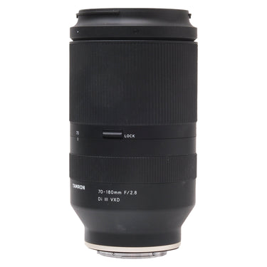 Tamron 70-180mm f2.8 Di III VXD front view standing upright with hood mounted