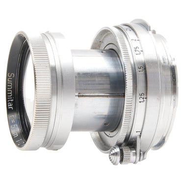 Leica Summitar collapsible lens side view showing distance scale and infinity lock
