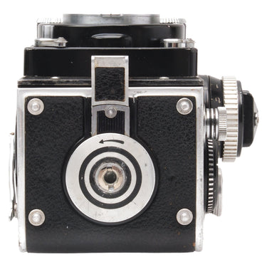 Rolleiflex 3.5F side view with film advance knob and focus controls