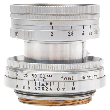 Leica 5cm f2 Summicron collapsible lens side view showing aperture scale and depth of field markings