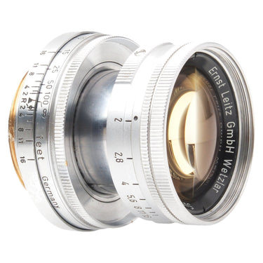 Leica 5cm f2 Summicron collapsed three-quarter view showing front glass and rings