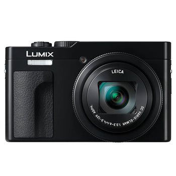 Panasonic LUMIX ZS99 compact camera in black, front view. Camera West