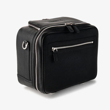 Black suitcase with zippers on a white background