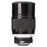 Nikon 180mm f2.8 Nikkor-P lens standing upright showing front barrel and NIKKOR-P Auto engraving