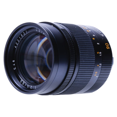 Leica Summarit-M 90mm angled front view showing glass and focus scale