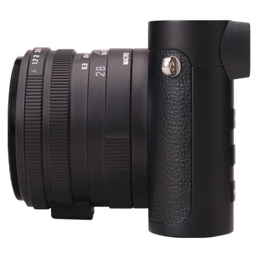 Leica Q2 Monochrom left side view with lens focus and aperture rings