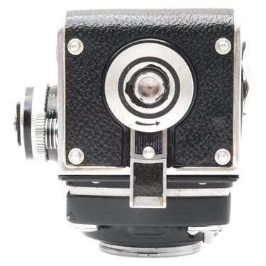 Rolleiflex 2.8E side view with film advance mechanism and focus knob