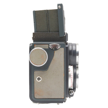 Rollei 4x4 Baby left side showing depth of field scale and rust spots on the covering