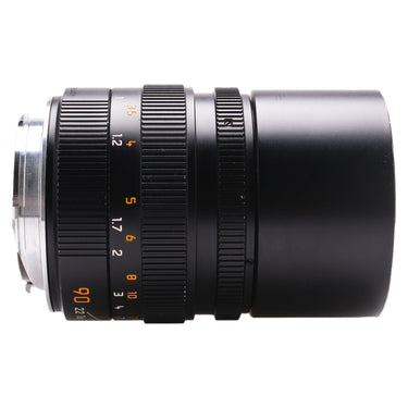 Leica 90mm f2.8 Elmarit-M lens side profile with focus and distance scales