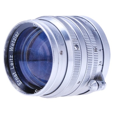 Leica Summarit 5cm f1.5 front glass element with focus scale, three-quarter view