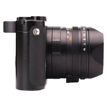 Leica Q2 left side showing handgrip and lens focus scale