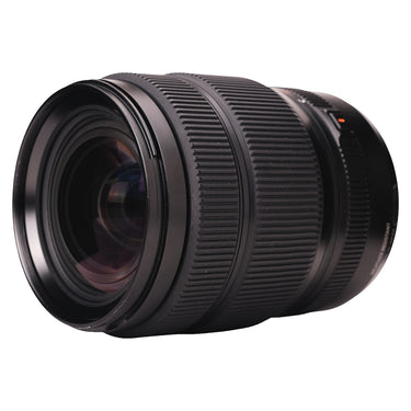 Fujifilm GF 32-64mm angled side view showing zoom and focus rings