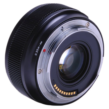 SG-image 35mm f2.2 lens angled rear view showing L-mount contacts and glass