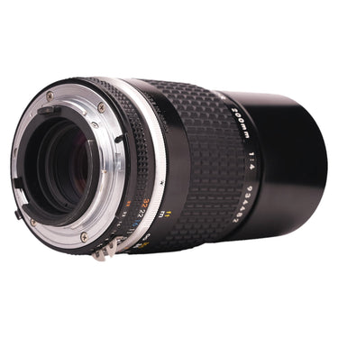 Nikon 200mm f4 Nikkor rear three-quarter view showing F mount and aperture ring