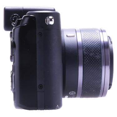Nikon 1 V1 left side with 10-30mm lens
