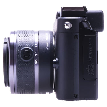 Nikon 1 V1 right side showing HDMI, USB and mic port cover