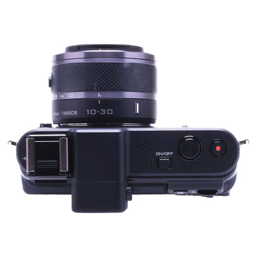 Nikon 1 V1 top view with 10-30mm lens and on/off switch