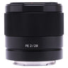 Sony FE 28mm f2 lens side view showing focus ring and FE 2/28 marking